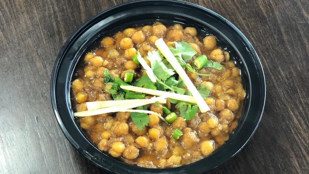 Chana Masala · Slow cooked Chickpeas, Famous gravy item, Try with Naan Bread or Rice.