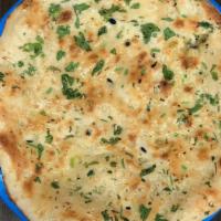 Garlic Naan 2 Pcs · Specialty Fresh & Finest Garlic Naan Bread, freshly baked in Tandoor with Garlic & herbs.