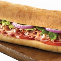 Club Sub · Turkey, ham, crisp bacon and mozzarella cheese; topped with red onions, lettuce, tomatoes an...