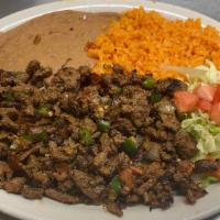 Carne Ala Mexicana Plate · Carne asada grilled with pico de gallo served with rice, re-fried beans. lettuce and tomato,...