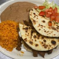 Quesadilla Plate · 2 flour/corn tortillas filled with melted white cheese and your choice of meat. served with ...