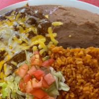 Carne Guisada Plate · 1/2lb of carne guisada served with 2 flour/corn tortillas, re-fried beans, and rice.