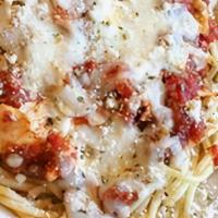 Grilled Chicken Parmesan · Sliced chicken breast with marinara over spaghetti, topped with mozzarella, parmesan cheese,...