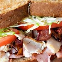 #40 Westover Club · Hickory ham, turkey breast, crispy bacon, melted provolone cheese with lettuce, tomato and m...