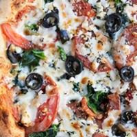 Lg Greek Pie · Homemade pizza sauce, spinach, onions, tomatoes, black olives, topped with feta and mozzarel...