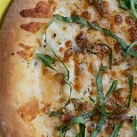 Lg White Ii · Garlic butter, parmesan, mozzarella and fontina cheeses sprinkled with fresh basil.