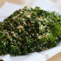 Hail The Kale · Fresh ribbons of kale lightly tossed with parmesan cheese and lemon olive oil dressing, topp...