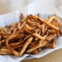 K Fries · Golden brown skin-on Kennebec potatoes, hand-cut, fried, sprinkled with pure ocean sea salt....