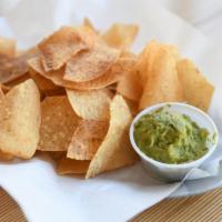 Chips & Guac · Our blend of thin-cut white corn tortillas, crispy taro chips and freshly made guacamole.