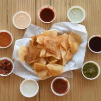 Chips & Flavor · Our blend of thin-cut white corn tortillas, fresh taro chips with your choice of 2 flavors. ...