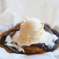Hunk Of Love · Semi-sweet chocolate chip cookie topped with vanilla frozen custard, caramel and real hot fu...