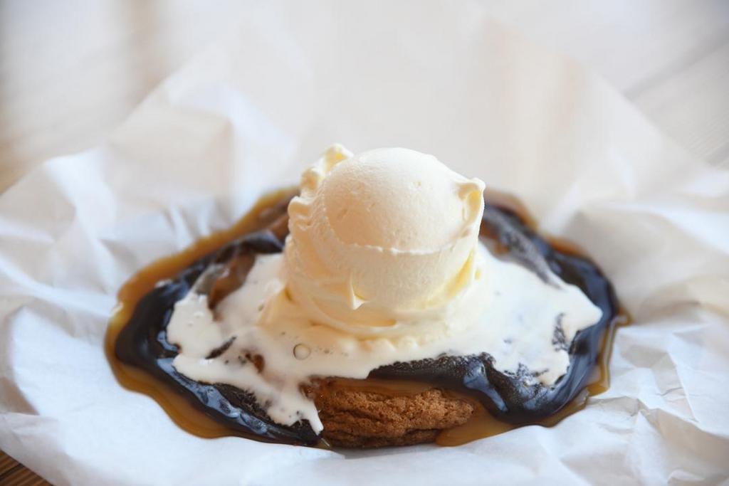 Hunk Of Love · Semi-sweet chocolate chip cookie topped with vanilla frozen custard, caramel and real hot fudge.