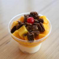 Mango Pecan · Vanilla frozen custard topped with fresh mangos, roasted pecans and two cherries.