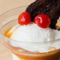 Salted Caramel Brownie Sundae · A warm chocolate brownie topped with fresh vanilla frozen custard, drenched in rich caramel,...