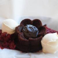 Kiss My Bundt · Chocolate bundt cake made from scratch in our kitchen, filled with hot fudge, topped with va...