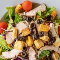 Grilled Chicken Salad · romaine lettuce, carrots, red cabbage, tomatoes, black olives, seasoned croutons and mozzare...