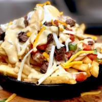 Loaded Steak · Diced grilled steak topped with pico de gallo, cheddar cheese, monterey cheese, sour cream a...