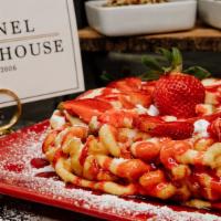 Strawberry Funnel Cake · Freshly prepared funnel cake, sprinkled with powdered and topped with freshly sliced strawbe...