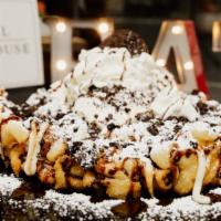 “The King”  Oreo Cookie Cheesecake Funnel Cake · Freshly prepared funnel cake, sprinkled with powdered sugar, cream cheese drizzle, delicious...