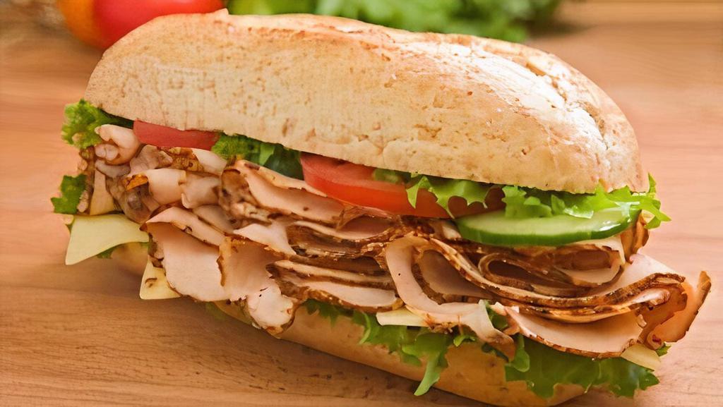 Roasted Chicken Sub  · Double roasted sliced chicken breast with your choice of cheese.