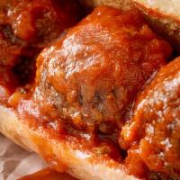 Meatball Sub · Homemade meatballs smothered in our marinara sauce and peppers.
