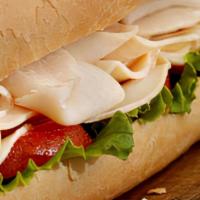 Turkey Sub  · Double  roasted sliced turkey breast with your choice of provolone, swiss or white American.