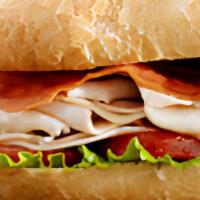 Chicken Club Sub · Double roasted sliced chicken breast and sugar cured bacon with your choice of cheese.