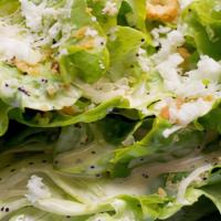 Caesar Salad · Romaine lettuce, asiago cheese and croutons.