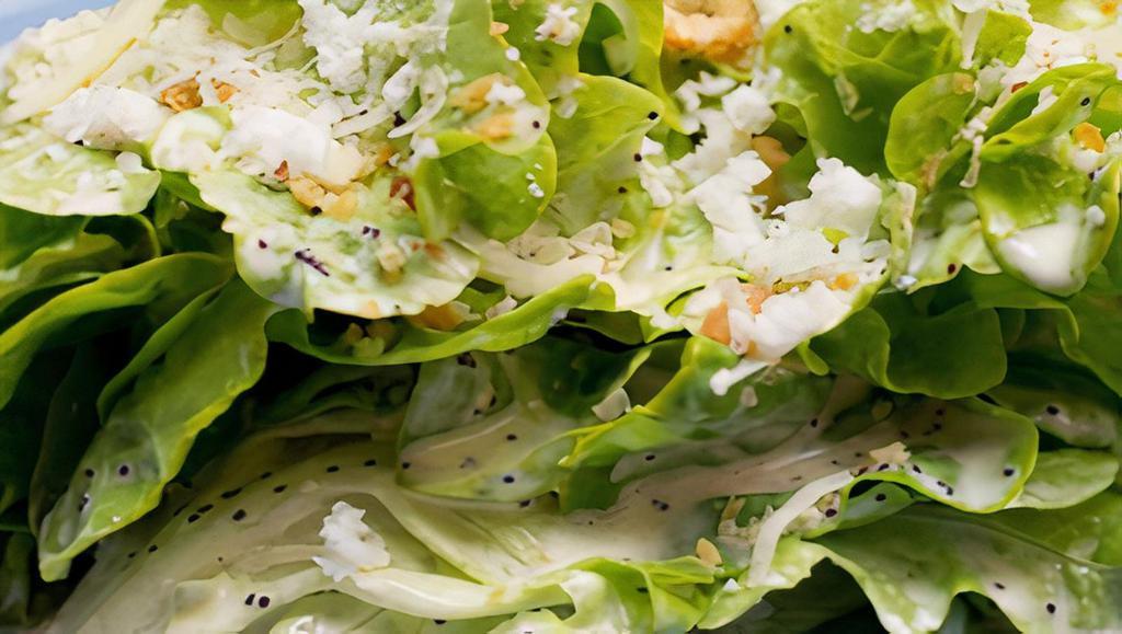 Caesar Salad · Romaine lettuce, asiago cheese and croutons.