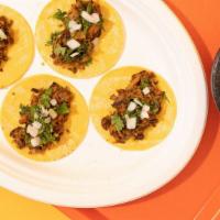 Vegan Asada Street Tacos (4) · Urban cowboy vegan meat (Asada), cilantro and onion served on corn tortillas. Served as 4 mi...