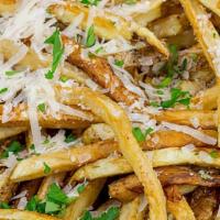 Truffle Fries · Served with garlic aioli, parmesan cheese, and truffle oil.