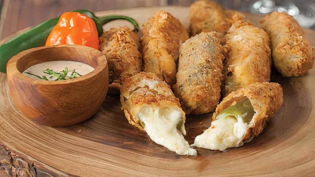 Pepper'S Jalapeño Poppers · Spicy. Handcrafted, Chipotle Ranch.