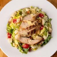 Grilled Chicken Caesar Salad  · Gluten-Free. Chopped Romaine Hearts, House Croutons, Sweet Grape Tomatoes, Shaved Parmigiano.