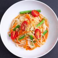 Som Tum · Mild spicy. Gluten-free. Slivers of green papayas, carrots, green beans, tomatoes, garlic, d...