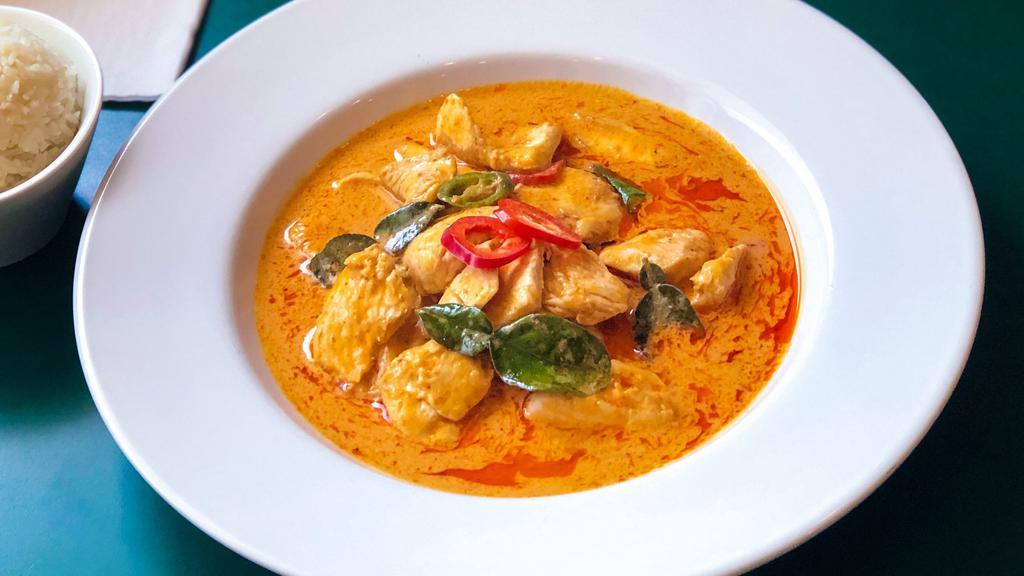 Panang Curry · Medium spicy. Gluten-free. A thick, salty, spicy and sweet curry with a touch of a nutty, aromatic and unique favor from herbs with the addition of lime leaves, sweet chilies, and serrano peppers.