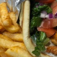 Classic Chicken Gyro · Lettuce, tomato, red onion, swiss cheese, topped with ranch, served with a side of fries.