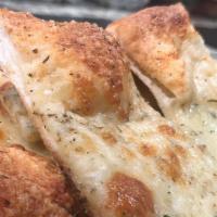 Garlic Butter Cheese Bread · Topped with 100% mozzarella and a sprinkle of pizza seasonings. Full order.