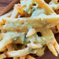 Queso Fries · Fresh french fries topped with chi'jeu queso, served with your choice of sauce