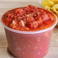 Salsa · Our homemade red tomato salsa served with chips.