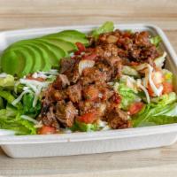 Ensalada Rancheros · Grilled steak tips tossed in our rancheros sauce mixed with. shredded cheese, grape tomatoes...