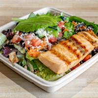 Salmon And Avocado Salad · Grilled honey lime salmon, sliced avocado, mixed baby greens,. mushrooms, black olives, carr...