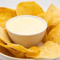 Cheese Sauce & Chips · Fresh house made Cheese sauce and Tortilla Chips