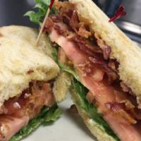 Blt · Hickory smoked bacon, lettuce, and tomato on sourdough