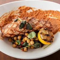 Char Grilled Salmon* · Chickpea hash, summer vegetables, red pepper romesco, olive relish