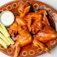 8 Wings · Fresh jumbo wings baked to perfection served with celery, carrots & cilantro lime ranch or b...