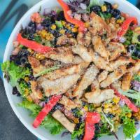 Southwest Chicken Salad · Mixed greens, diced tomatoes, black olives, red onions, red bell peppers, and sweet corn top...