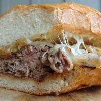 French Dip · Roast beef, provolone, grilled onion, toasted roll, au jus on the side.