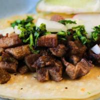 Lengua · Classic Mexican, beef tongue which has been braised with garlic  and onions