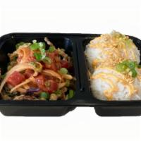 Spicy Tuna Poke · Spicy tuna with onions, fried onions, spring mix and side of rice with spicy mayo and scalli...