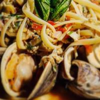 Pasta Allo Scoglio · Fettuccine pasta, shrimps, clams, calamari, lobster, mussels, scallops, and creamy lobster s...